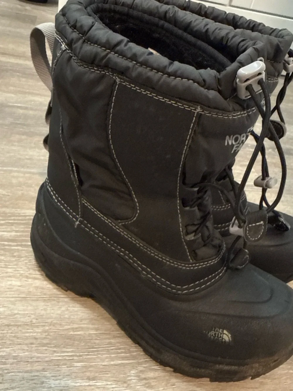 The North Face Kids Black Insulated Snow Boots with Bungee Closure